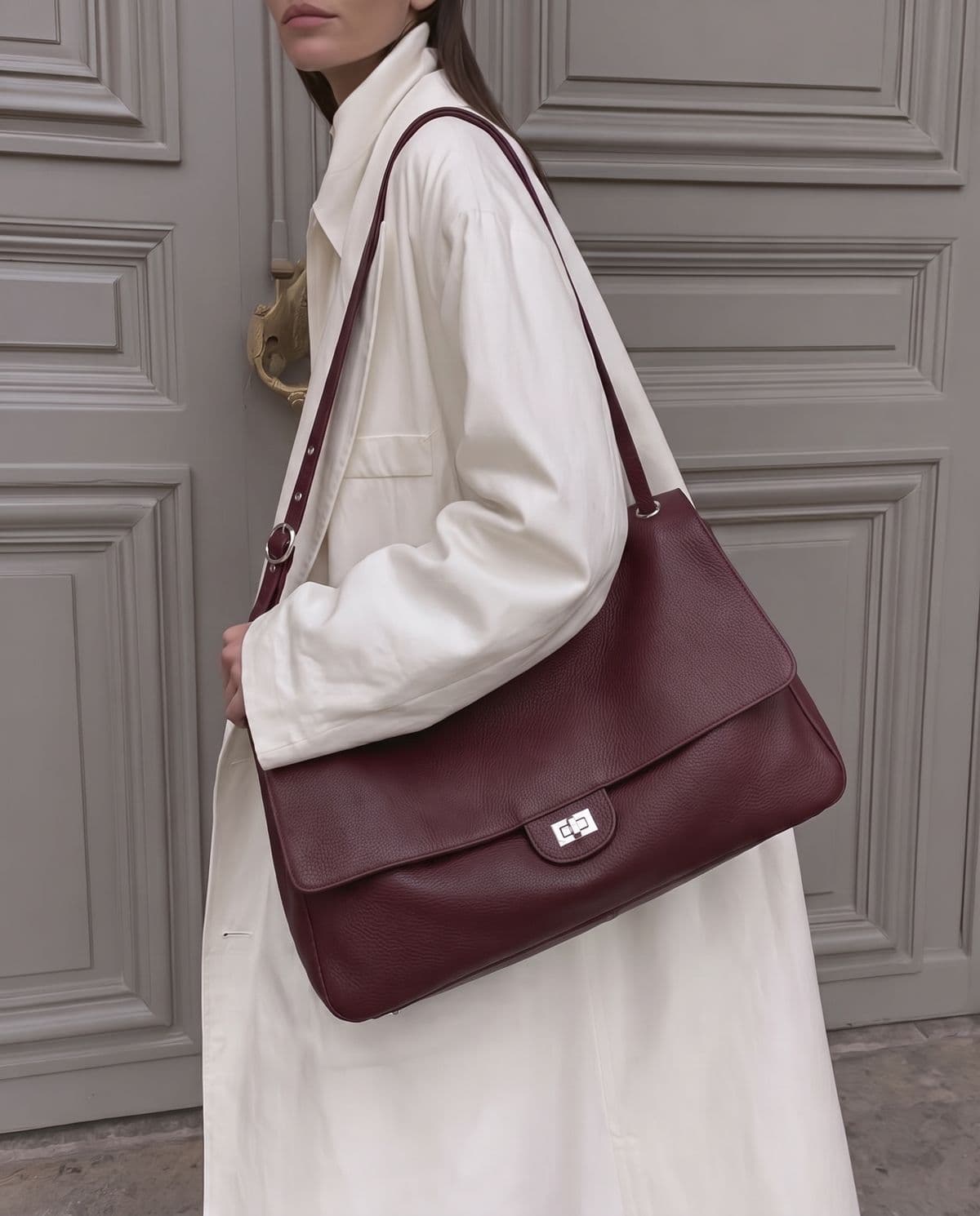 The Cherry Bag worn on the shoulder